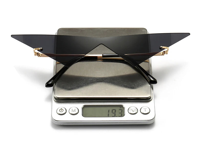 Rimless Cat Eye Sunglasses - Oversized Triangle Design with UV400 Protection